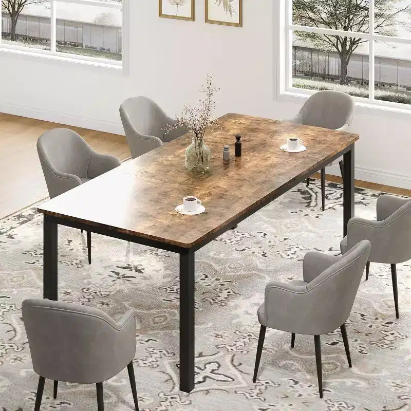 Table de salle à manger rectangulaire avec plateau en bois et pieds en métal, idéale comme table de cuisine